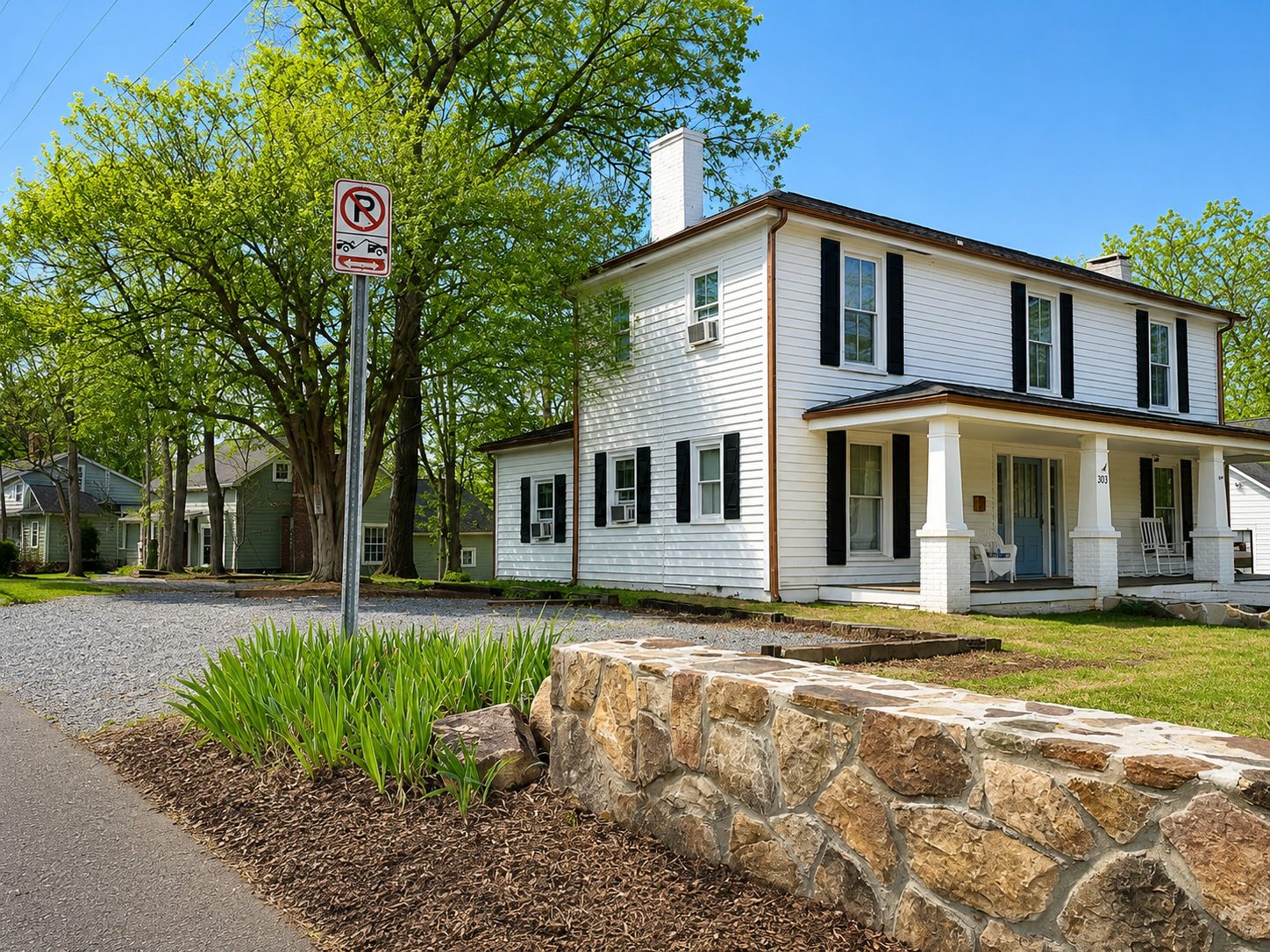 Front elevation and landscaped gardens of the Gabriel Utley House
